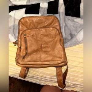 Leather backpack with multiple compartments